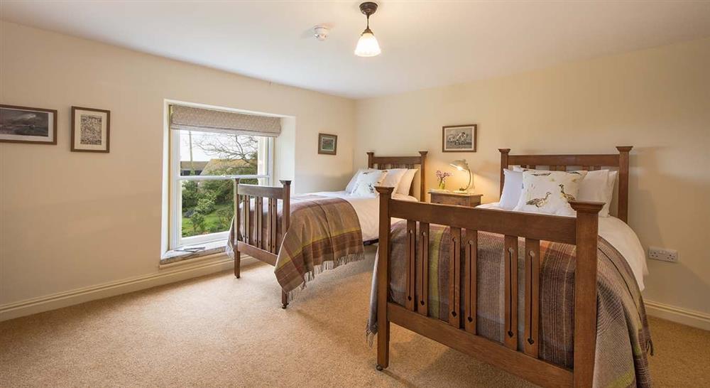A twin bedroom (photo 2) at Mottistone Manor Farmhouse in Newport, Isle Of Wight
