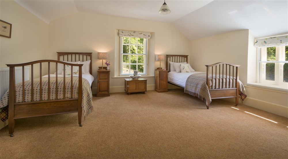 A twin bedroom (photo 3) at Mottistone Manor Farmhouse in Newport, Isle Of Wight