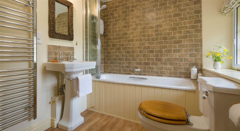 An en-suite bathroom at Mottistone Manor Farmhouse in Newport, Isle Of Wight