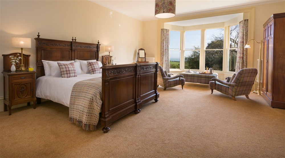 One of the double bedrooms at Mottistone Manor Farmhouse in Newport, Isle Of Wight