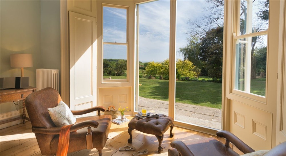 The large sitting room (photo 2) at Mottistone Manor Farmhouse in Newport, Isle Of Wight
