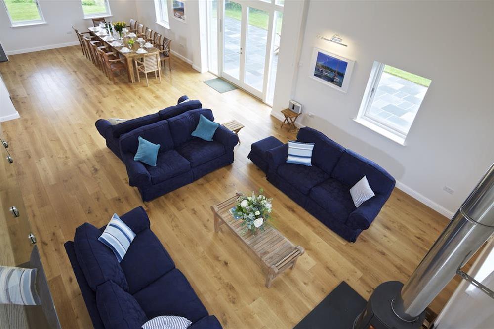Overlooking the living area from the first floor mezzanine level at Moult Hill Barn in , Salcombe