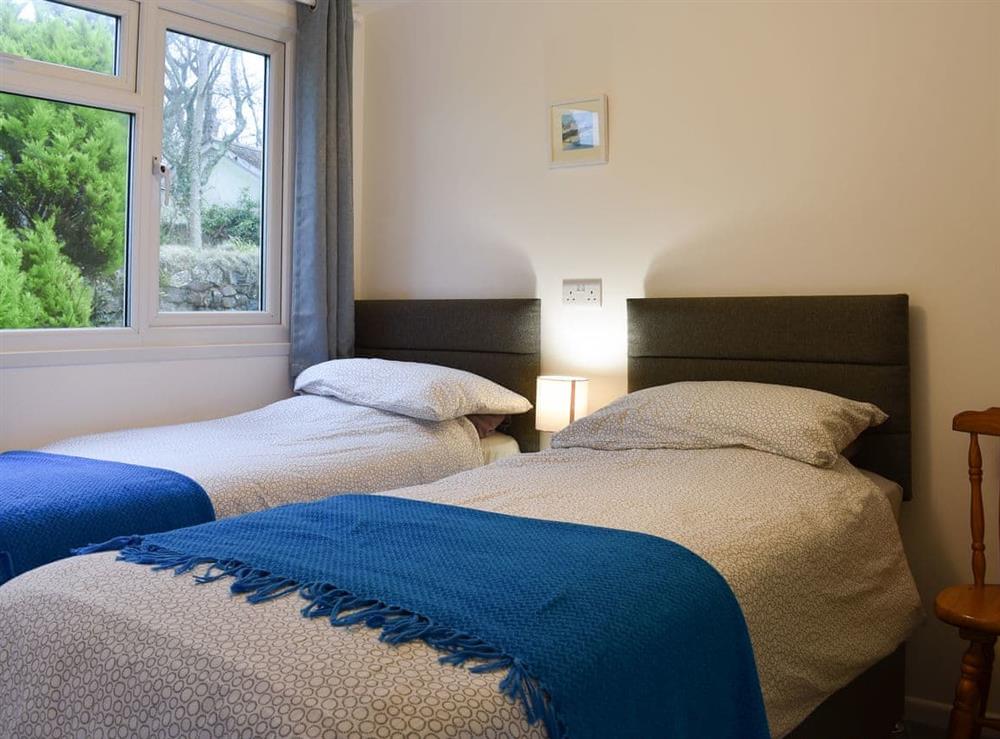Inviting bedroom with twin single beds at Chalet 4, 