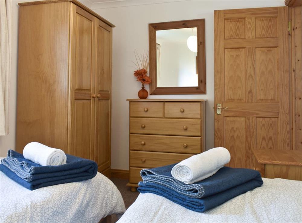 Ample storage within the twin bedroom at Prince Croft Cottage, 