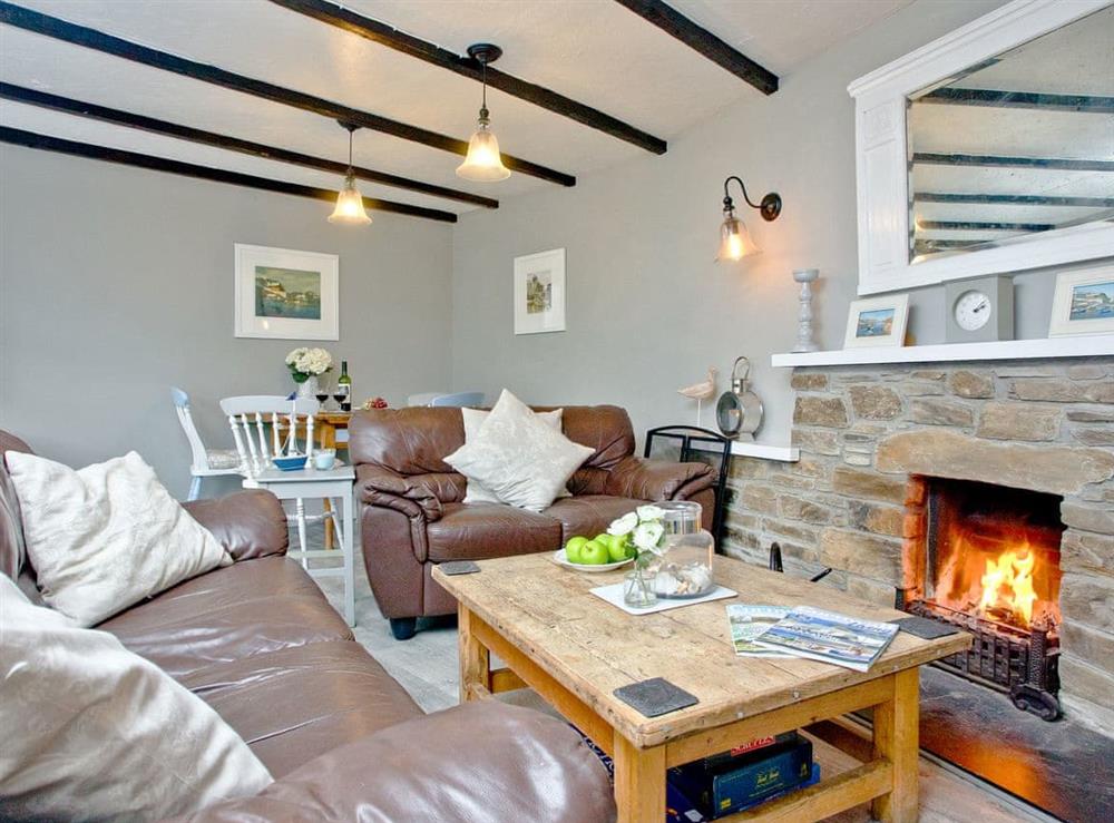 Delightful living/ dining room at Mount Street Cottage in Mevagissey near St. Austell, Cornwall, England