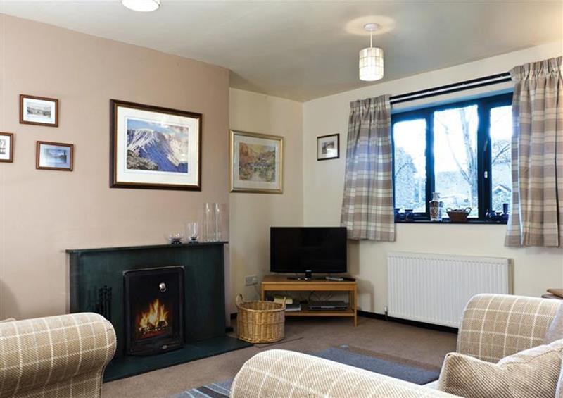 Relax in the living area at Mountain Ash Cottage, Coniston