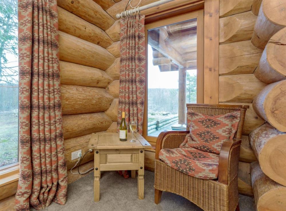 Peaceful sitting area in the bedroom at Mountain Bear Lodge in Nethy Bridge, near Aviemore, Highlands, Inverness-Shire