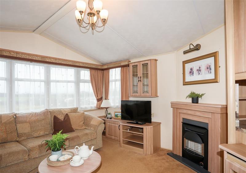 Relax in the living area at Mountain view 2, Caergeiliog near Valley