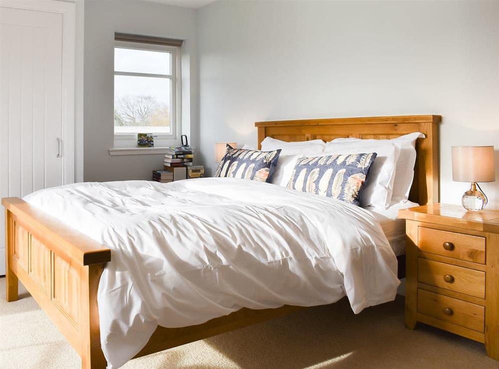 Master bedroom at Moy Bridge Croft in Wester Moy, near Strathpeffer, Ross-Shire