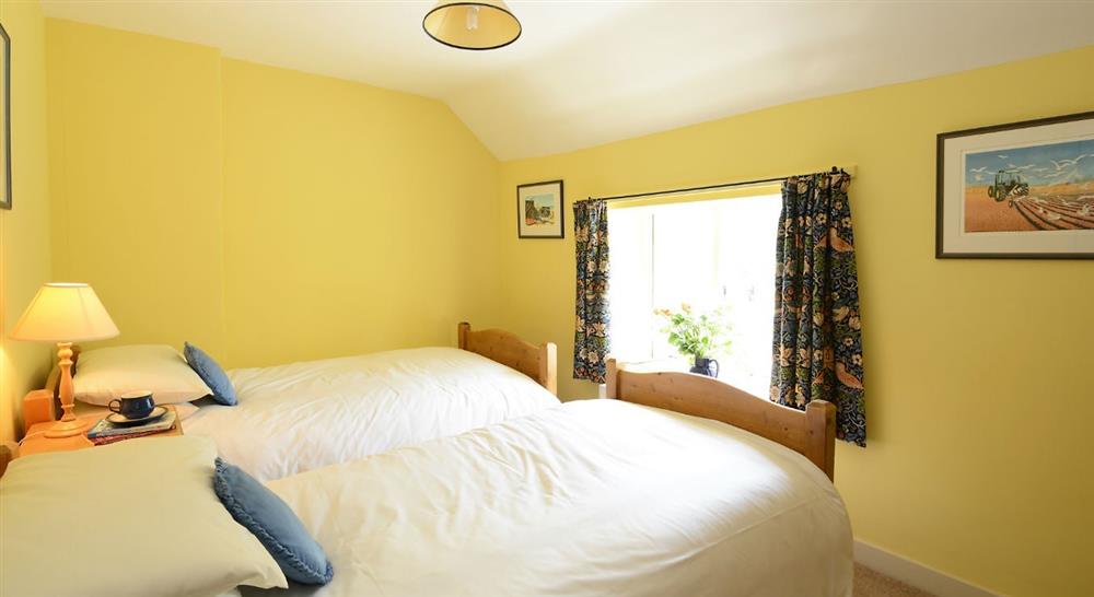 The twin bedroom at Mrs Preedys Cottage in Burnham-overy-staithe, Norfolk