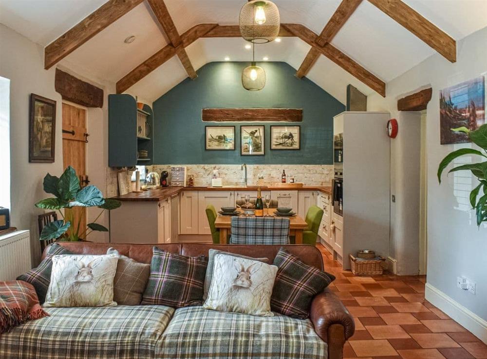 Open plan living space at Mudhorse Cottage in Burnham-on-Sea, Somerset