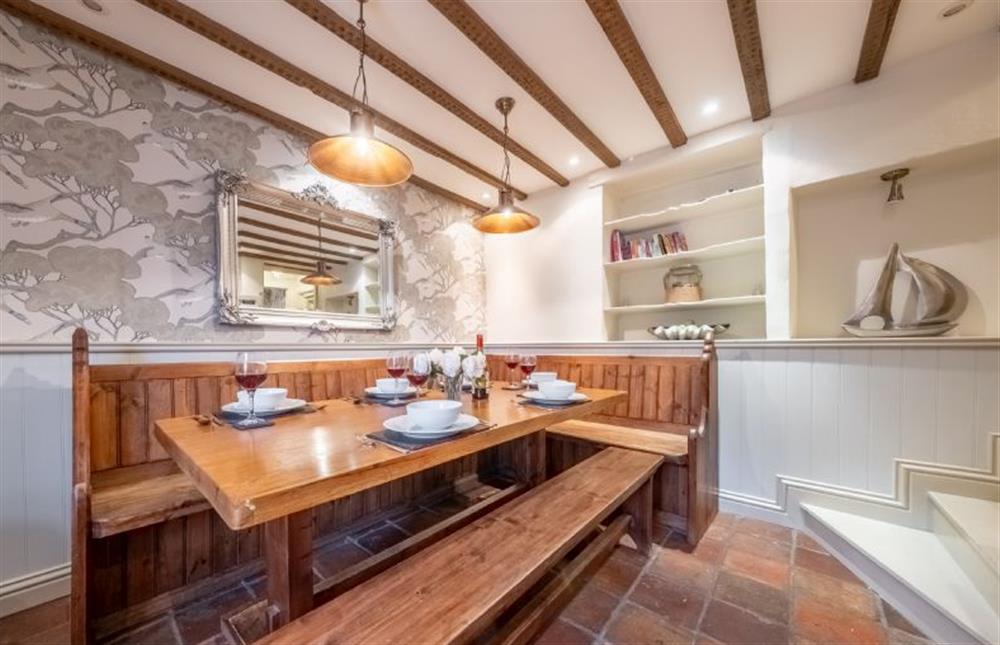 Dining table with seating for five at Mulberry Cottage, Holt