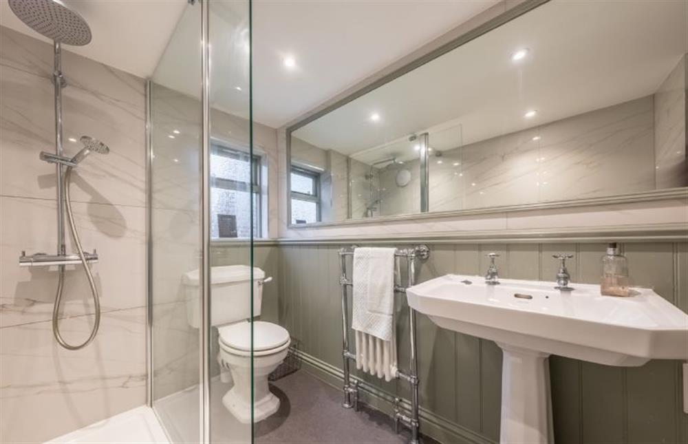 Modern shower room with rainfall shower at Mulberry Cottage, Holt