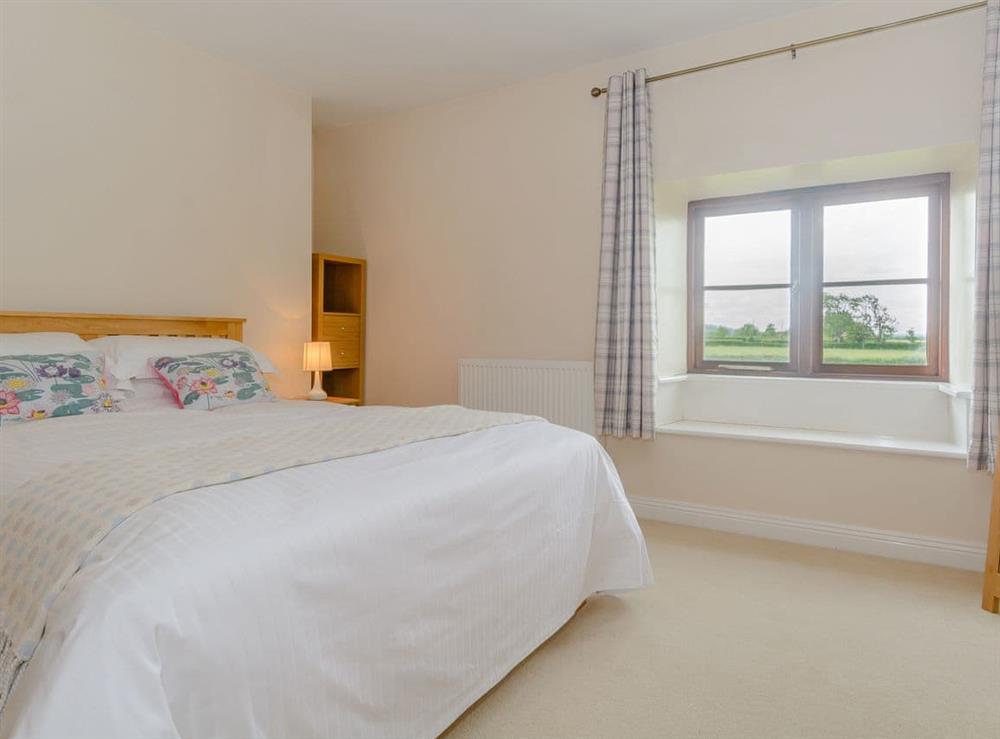 Relaxing double bedroom at Mulberry Cottage in North Wooton, near Wells, Somerset