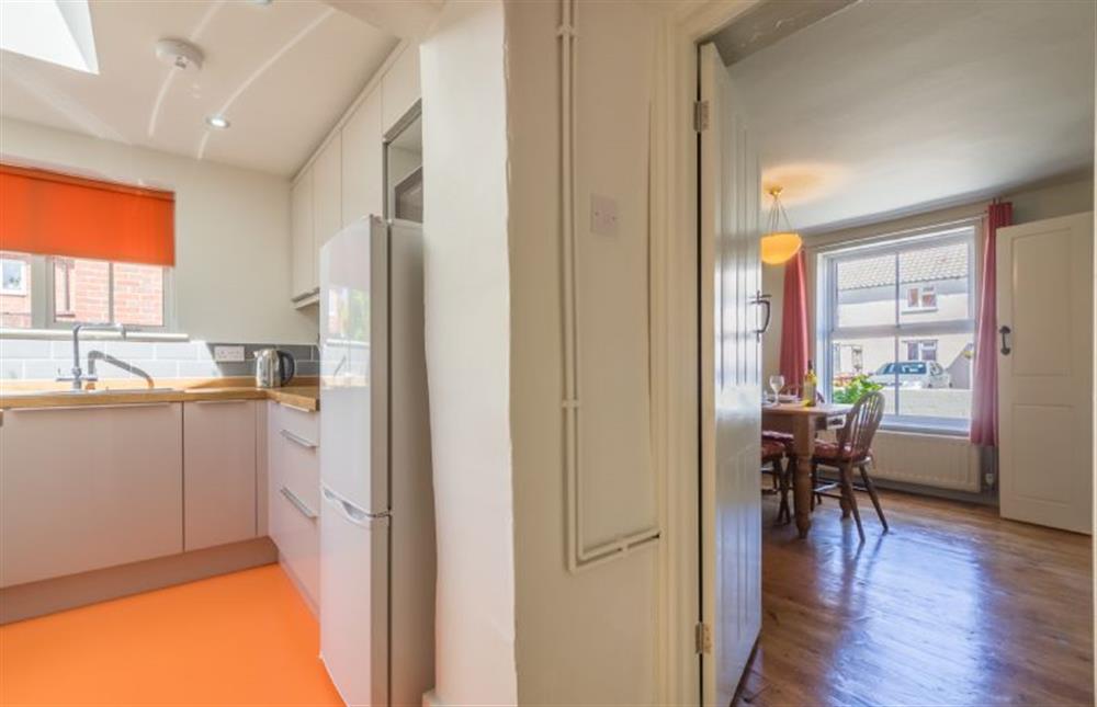 Ground floor: Kitchen leading to dining room at Mulberry Cottage, Wells-next-the-Sea