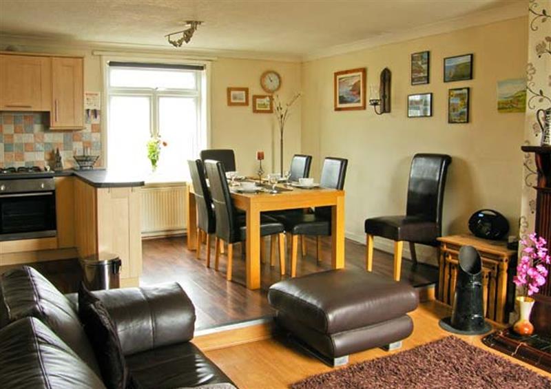 Relax in the living area at Mulgrave Cottage, Port Mulgrave