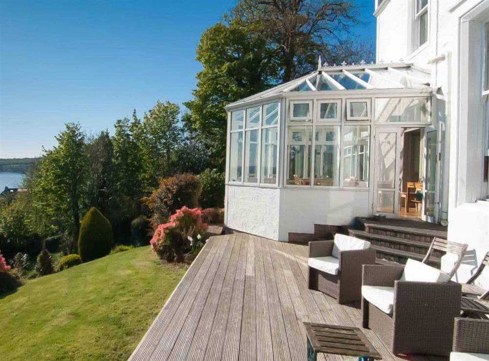 Relax on the sunny decked area and take in the wonderful view at Munros in Rothesay, Isle of Bute, Argyll and Bute, Scotland