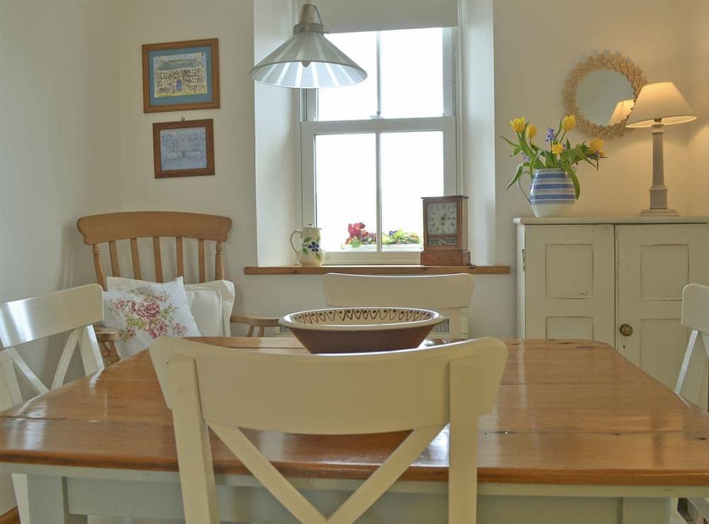 Dining area at Mur Llwyd in Rhoshirwaun, near Pwllheli, Gwynedd