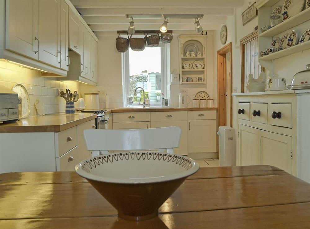 Open plan kitchen/dining space at Mur Llwyd in Rhoshirwaun, near Pwllheli, Gwynedd