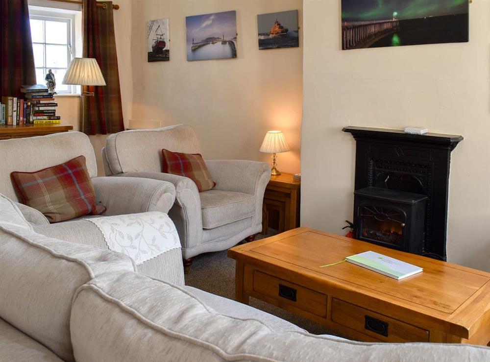 Cosy living room (photo 2) at Murmuration Cottage in Whitby, North Yorkshire