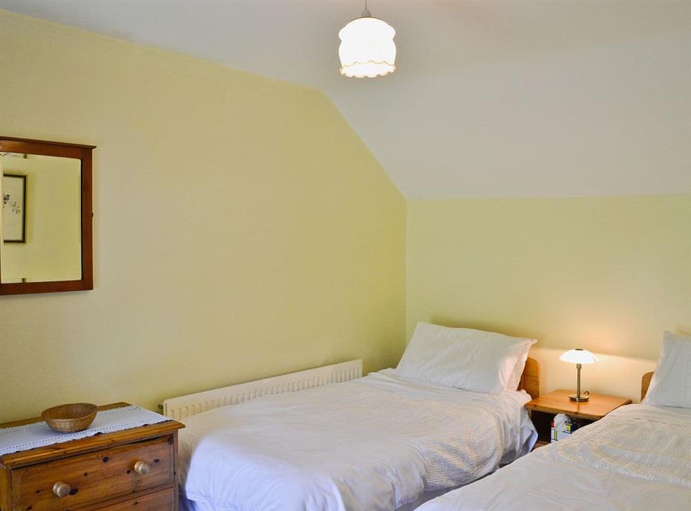 Twin bedroom at Murton Farm Cottage in Murton, West Glamorgan