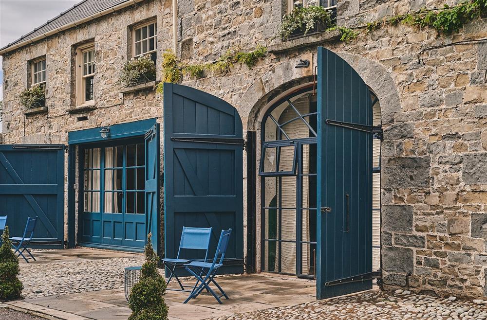 The entrance to the studio apartment and a table and chairs