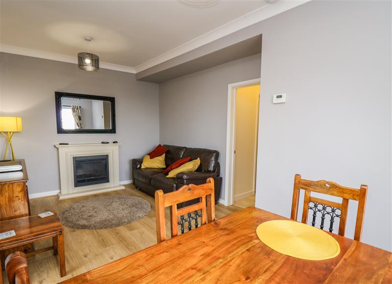Relax in the living area at Mynydd ar Mor, Barmouth