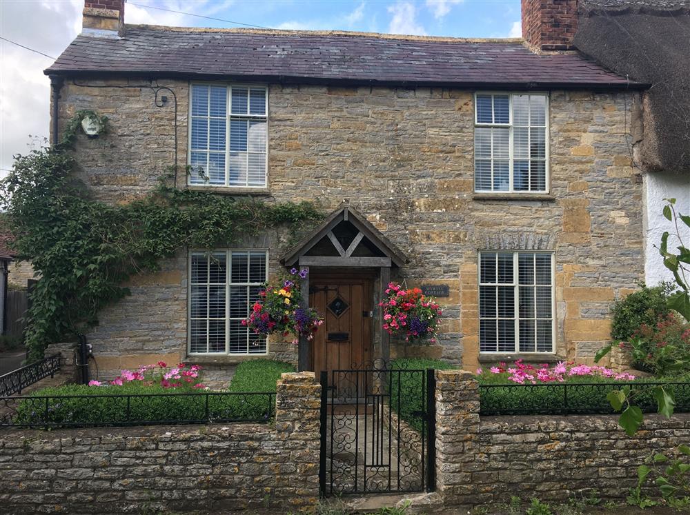 Myrtle Cottage is a luxurious character Grade II listed cottage complete with hot tub set in a popular Cotswold village