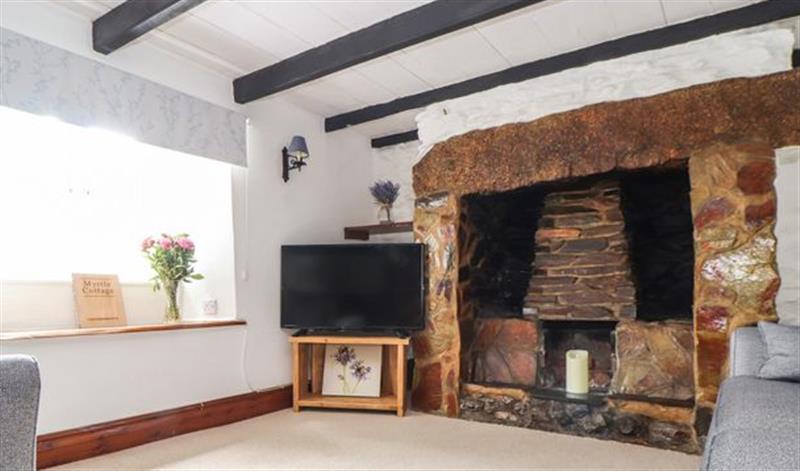 Enjoy the living room at Myrtle Cottage, Connor Downs