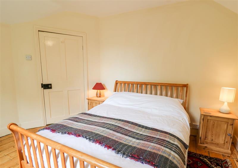 A bedroom in Myrtle Villa at Myrtle Villa, Knighton