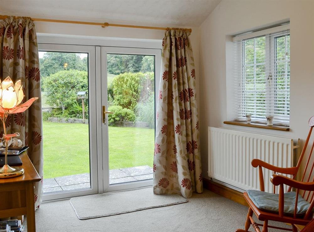 Light and airy living room with garden access at Nant y Bwthyn in Dol-y-Bont, near Borth, Cardigan-Ceredigion, Dyfed