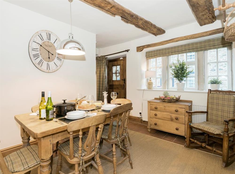 Convenient dining area within kitchen at Narrowgates Cottage in Barley, near Barrowford, Lancashire, England