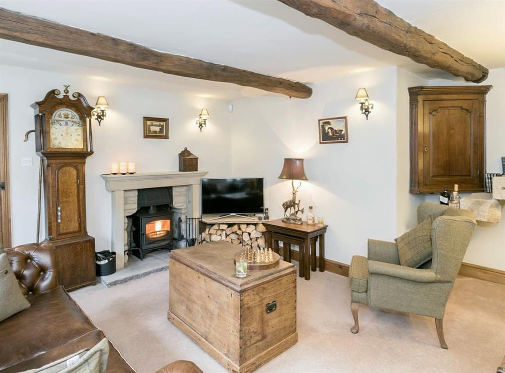 Exposed wood beams in living room at Narrowgates Cottage in Barley, near Barrowford, Lancashire, England