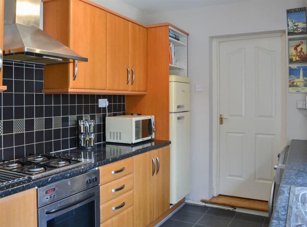 Well-equipped galley style kitchen at Naters Apartment in Cullercoats, near Whitley Bay, Tyne and Wear