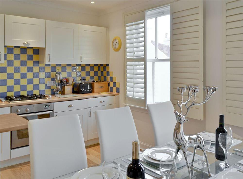 Dining area conveniently close to kitchen at Nautilus Cottage in Cellardyke, near Anstruther, Fife