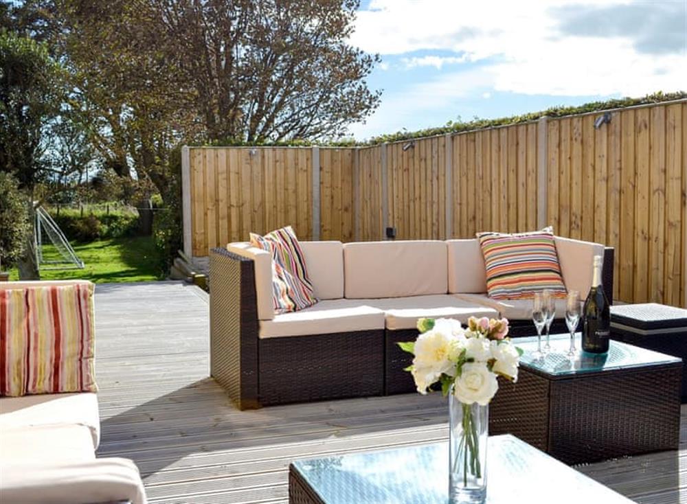 Patio with garden furniture at Neeprig in Skinburness, near Silloth, Cumbria