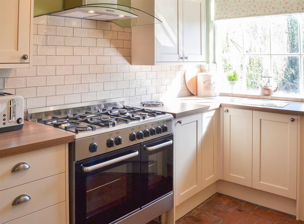 Lovely tiled kitchen at Nells Cottage in Bridlington, North Humberside