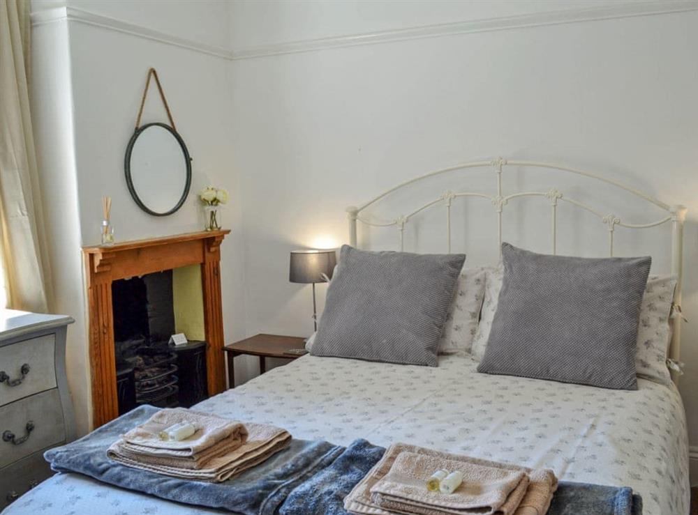 Stylishly furnished double bedroom at Nells Cottage in Bridlington, North Humberside