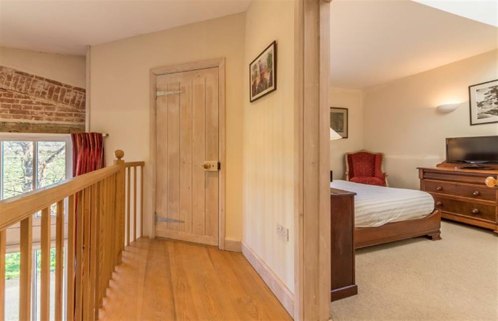 First floor: Master bedroom at Nelsons Barn, Burnham Thorpe near Kings Lynn