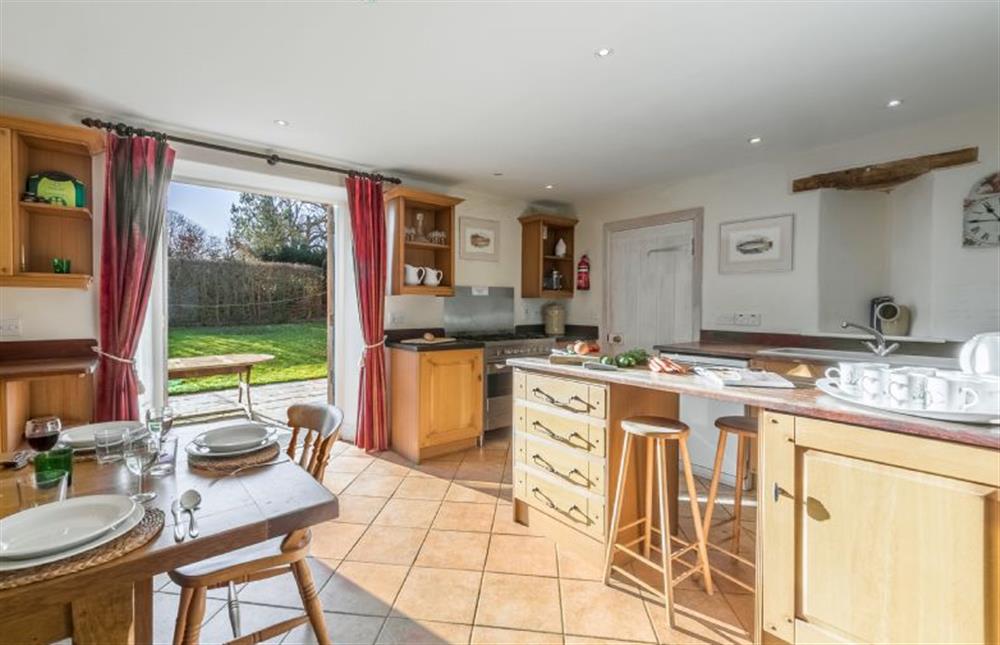 Ground floor: Bright kitchen with french doors to the garden at Nelsons Barn, Burnham Thorpe near Kings Lynn