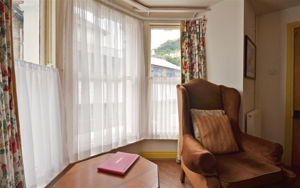 The comfortable window seat at Nelsons Cottage in Looe