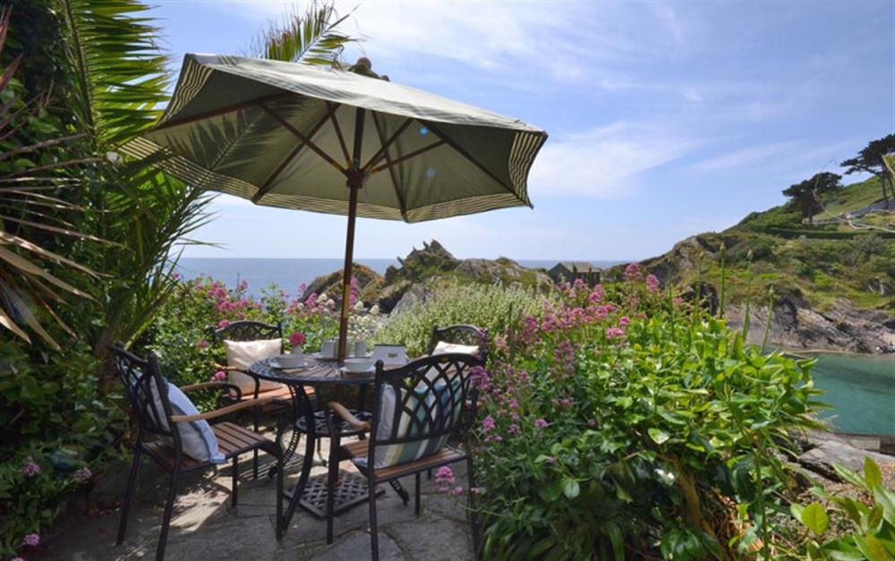 Enjoy some al fresco dining from this stunning spot! at Nepenthe in Polperro
