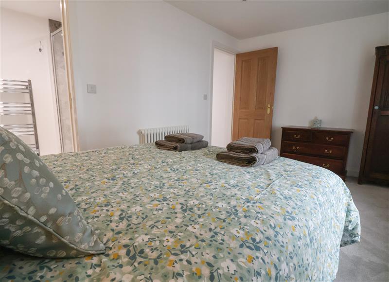 This is a bedroom (photo 3) at Neptune Cottage, Conwy