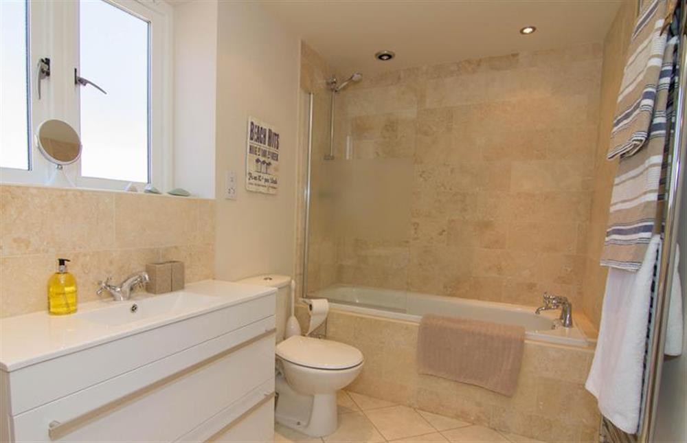 First floor: Family bathroom with shower over at Neptune Cottage, Old Hunstanton