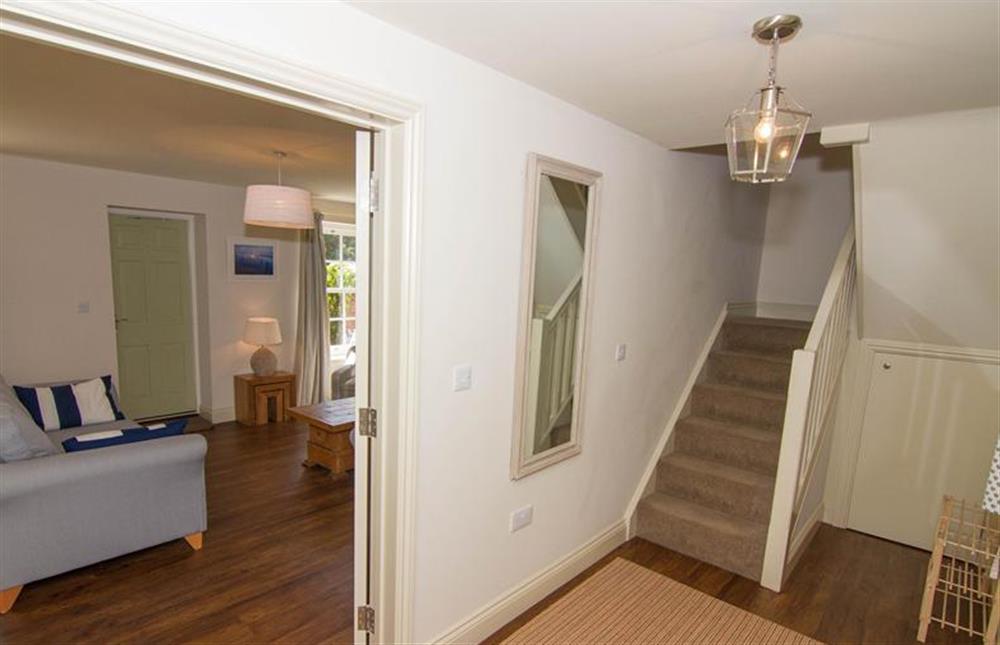 Ground floor: Sitting room and stairs to first floor at Neptune Cottage, Old Hunstanton