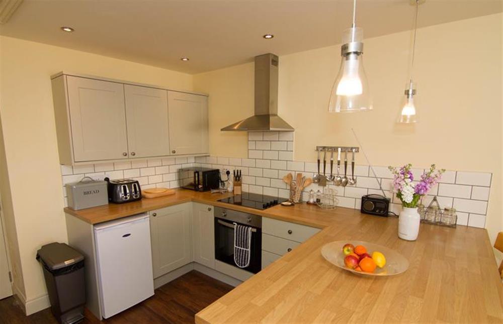 Ground floor: Well equipped modern kitchen at Neptune Cottage, Old Hunstanton