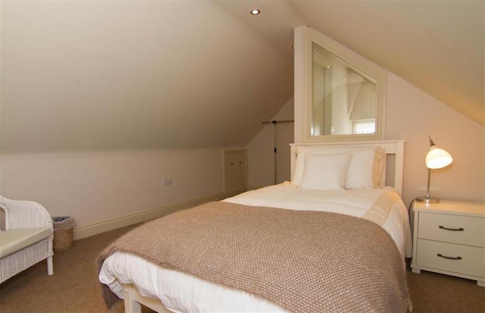 Second floor: Bedroom three, full size single bed at Neptune Cottage, Old Hunstanton