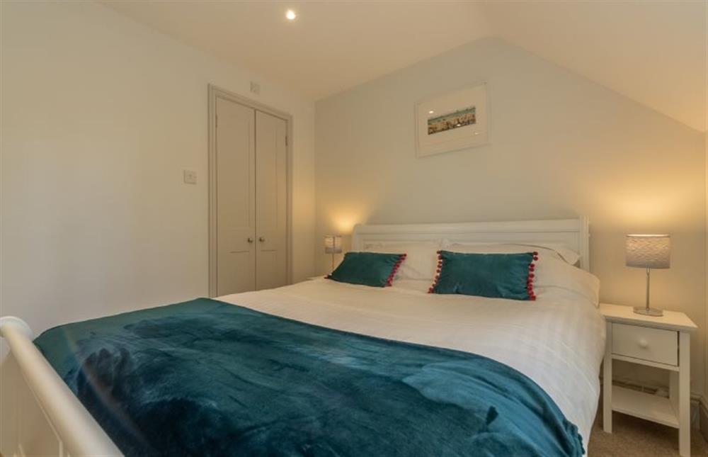 First floor: Master bedroom leading to en-suite at Neptune House, Wells-next-the-Sea