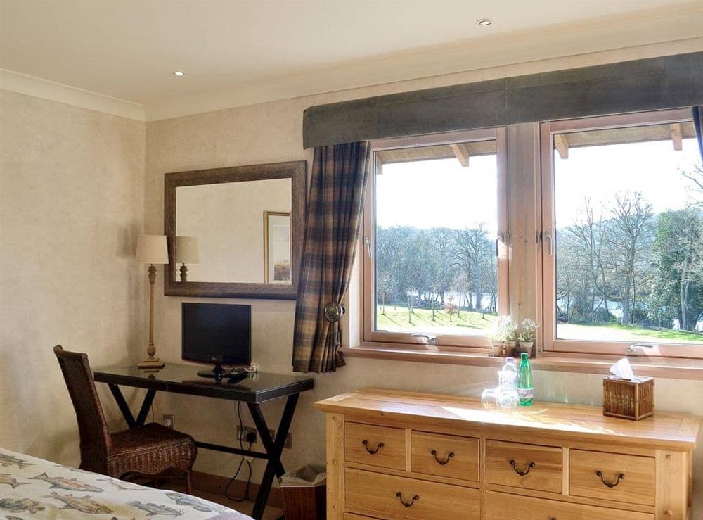 Enjoy the lovely views from this fabulous double bedroom at River Lodge, 