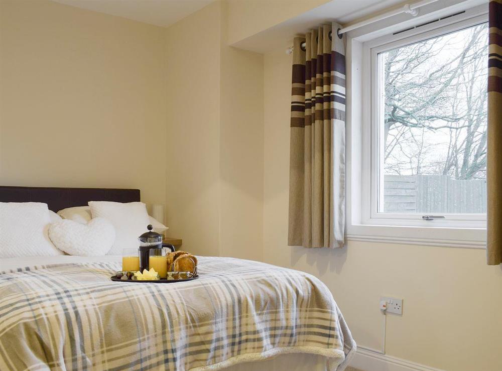Comfortable double bedroom at Kinneddar Cottage, 